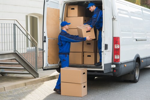 Commercial move team handling office items in a Lambeth property