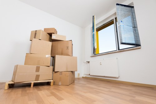 Packed office boxes and labelled items ready for relocation