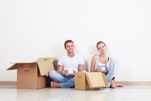 Professional removals loading in a South London street