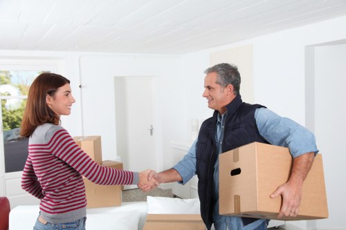 Packed boxes and furniture ready for transport during a local move in Lambeth